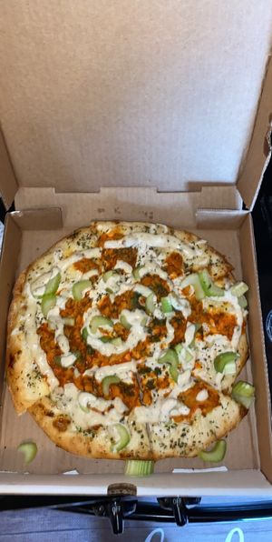 Buffalo chicken pizza at Pi Vegan Pizzeria in Seattle