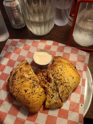 Meat Lovers Calzone at Pi Vegan Pizzeria in Seattle