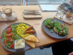 Vegan breakfast - avocado toast and scrambled tofu at Share Sweet and Espresso Bar in Prague