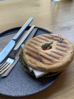 Bagel with goat cheese, pesto and dried tomatoes   at Share Sweet and Espresso Bar in Prague