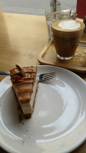 Lotus cheesecake and flat white at Share Sweet and Espresso Bar in Prague