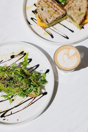 Avocado sourdough bread with tomato-chickpea spread  at Share Sweet and Espresso Bar in Prague