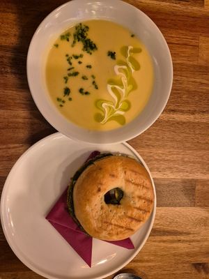 Delicious Cauliflower soup and bagel with pesto and sun dried tomatos. at Share Sweet and Espresso Bar in Prague