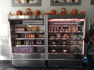 Fridge with items to takeout or eat in (they can heat things up for you if necessary). at 2Beans in New York City