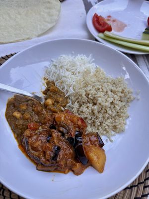 Aubergine/potato, chickpea/spinach (with forgotten spinach), rice and papadum. Added our own salad and quinoa 🌱   at The Red Fort II in Mallorca