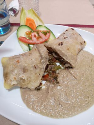 Mushrooms and broccoli crepe with aubergine sauce at Vegan Mount in Barcelona