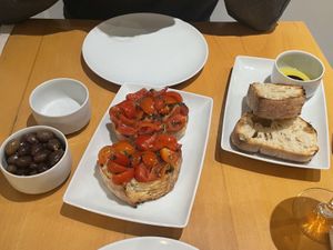 Antipasti - olives, bruschetta and homemade bread with olive oil & balsamico.  at Pizzeria Lume in Funchal