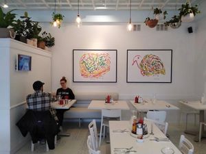 Silence Heart Nest restaurant dining room artwork at Silence-Heart-Nest Vegetarian Restaurant in Seattle