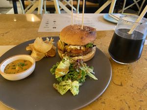 Charcoal coke and tofu burger   at Greenr Cafe in New Delhi