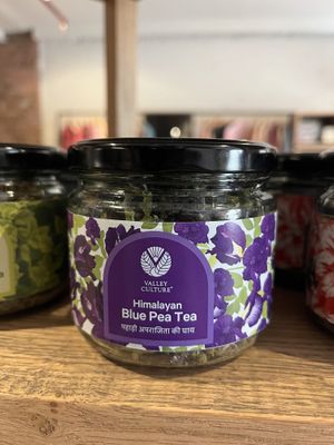 Shop sells many nice things, both edible and not (like candles and body care)   at Greenr Cafe in New Delhi