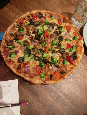 Vegan pizza tasted truly delicious 😋 at Greenr Cafe in New Delhi