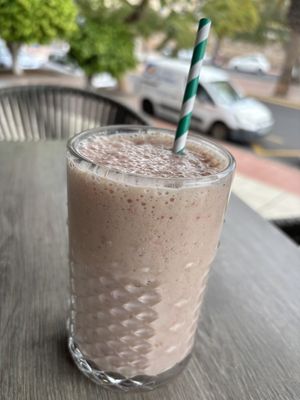 Caribbean kiss smoothie with oat milk   at Sisters Coffee Shop And Kitchen in Tenerife