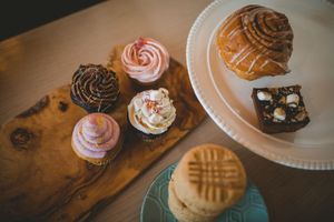 Cupcakes, Peanut Butter Cookies, Cinnamon Roll, and Smores Bar. at Edible Flours in Vancouver