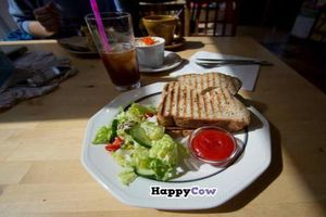 Vegan grilled tofu sandwich with mushrooms instead of cheese. Comes with a salad and some ketchup. at C is for Cookie in Reykjavik