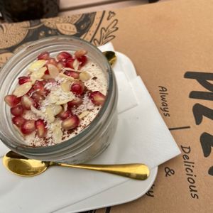 Vegan tiramisu with pomegranate seeds and coconut flakes   at Wolke in Vienna