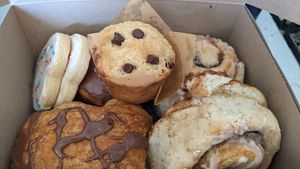 Sugar cookies, chocolate chip muffins, cinnamon buns, Boston cream doughnut and chocolate croissant 😍🤤❤️ at Arise in Lethbridge