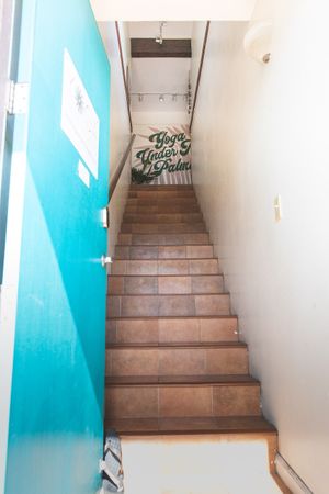 Our cafe is located just up the stairs at Plant Based Paradise Kailua in Kailua