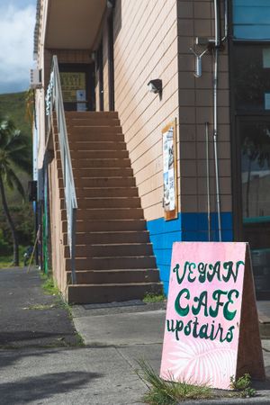 We are up 2 flights of stairs in Yoga Under the Palms at Plant Based Paradise Kailua in Kailua