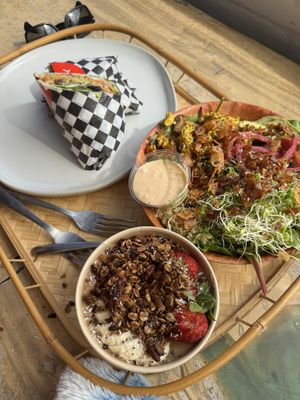 Buffalo cauliflower wrap, breakfast bowl & the cacao nirvana smoothie bowl - all very good   at Plant Based Paradise Kailua in Kailua
