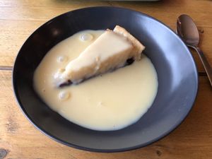 Bakewell tart w/ warm custard at VK Plant Based Diner in Waterlooville