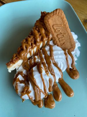 Biscoff cheesecake w/ whipped cream at VK Plant Based Diner in Waterlooville