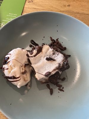 Chocolate caramel warm brownie stack with ice cream  at VK Plant Based Diner in Waterlooville