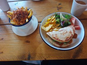 'Fishless' finger flatbread and dirty fries. Delicious! at VK Plant Based Diner in Waterlooville