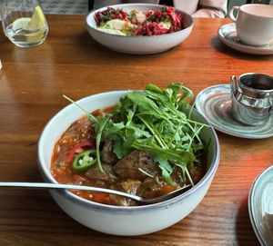 Eggplant stew with tomato and fried potatoess  at Lendav Maaler in Tallinn