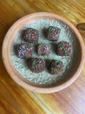 Breaded tofu with peanut sauce   at Cumbre Masa Madre in Cali