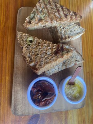 AMAZING sourdough bread with hummus and tomatoes   at Cumbre Masa Madre in Cali