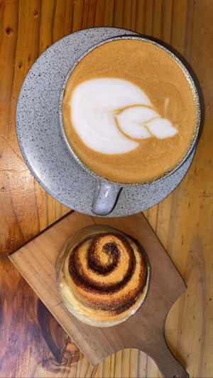 Really good coffee and fluffy cinnamon roll (also sourdough )  at Cumbre Masa Madre in Cali