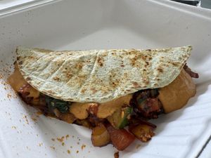 Quesadilla - don’t forget a side of avocado sauce  at The Squeeze Juice Bar and Vegan Eatery in Vicksburg
