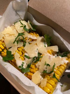 Vegetarian corn ribs with truffle and Parmesan shavings for my fella at Leon in Cobham