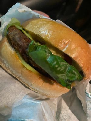 Regular burger on brioche bun  at Leon in Cobham