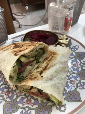 The veggiewrap with fermented beetroot on the side   at Vegan Spectrum مطبخ الطيف النباتي in Amman