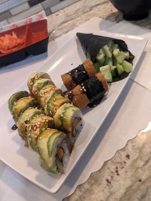 Tempura veggie long roll, inari nigiri, cucumber hand roll at Sushi Rose in Reno
