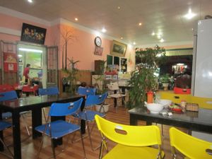 There is plenty of room in the second room of the restaurant at An Lac Tam - P2 in Da Lat