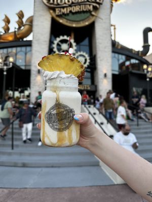 Vegan pineapple upside down cake, brown sugar, caramel, pineapples, oatmilk whipped topping  at Universal Studios - The Toothsome Chocolate Emporium & Savory Feast Kitchen in Orlando