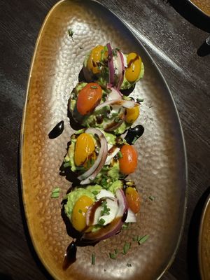 The avocado bruschetta was delicious too and even had vegan feta   at Universal Studios - The Toothsome Chocolate Emporium & Savory Feast Kitchen in Orlando