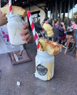 Upside down pineapple milkshake   at Universal Studios - The Toothsome Chocolate Emporium & Savory Feast Kitchen in Orlando