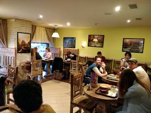 restaurant interior. thank you to the couple for being sporting  at Jagannath na Kurskoj in Moscow