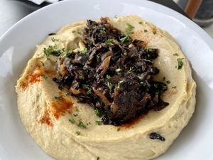 Hummus bowl w onions + mushrooms  at Artcaffé in Nairobi