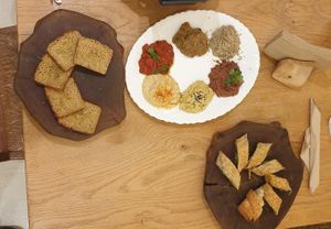 Dips gluten free bread at DaOrganic restaurant in Sofia