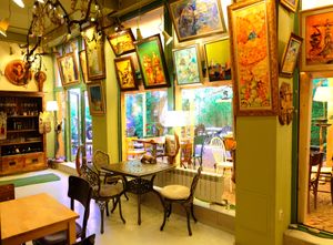 Beautiful interior with painting and sculptures exhibitions of famous bulgarian artists. at DaOrganic restaurant in Sofia