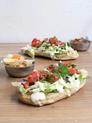 Tlacoyos rellenos de garbanzo con queso de semilla de girasol y crema de nuez de la India at Yam in Aguascalientes