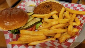 vegan chicken sandwich with lettuce pickles and tomato at Farren's Pub & Eatery in Champaign