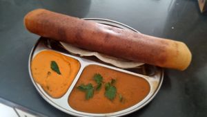 Masala Dosa 
light, soft, crispy lentil & rice  crepe filled with seasoned mashed potato served with sambar & Chutney 
Vegan/ Gluten free/ Dairy free at Udupi Flavours In Australia in Rockbank