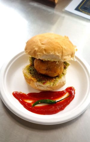 Vada Pav 
Potato fritter sandwiched  between jumbo bread layered with spicy garlic chutney 
Vegan/ dairy free / contains gluten  at Udupi Flavours In Australia in Rockbank