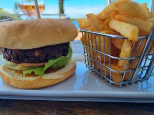 Burger and super crunchy fries at Tathra Hotel in Tathra
