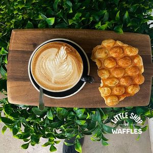 Our cheese Croffle (croissant x waffle) is a fav with coffee at Little Shop of Waffles in Manly
